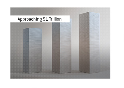 Three tall stacks of layered paper arranged like rising towers, symbolizing Elon Musk�s rapidly growing net worth approaching the one trillion dollar mark.