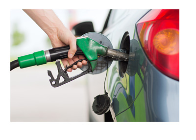 Car being filled with gas at station - Gas prices