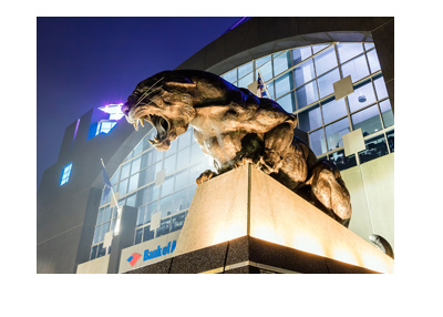 Carolina Panthers stadium front.  Roaring panther statue. Night shot.