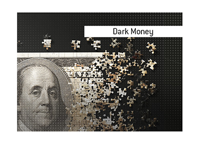 The meaning of Dark Money is explained when it comes to US politics.  In photo:  A stylized US dollar as a jigsaw puzzle.