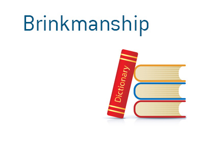 Dictionary entry for the term Brinkmanship when it comes to politics and finance