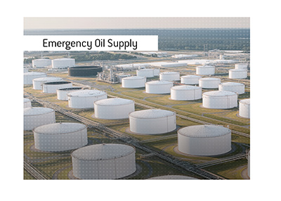 Aerial view of large white oil storage tanks forming part of the United States emergency petroleum reserve.
