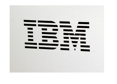 Photograph of the IBM company sign. Black lettering on white background. Year is 2017.