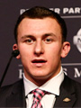 Johny Manziel wearing a suit at the 2012 Heisman finalists press conference