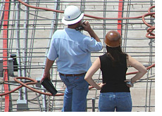 -- Construction site - Man and Woman workers --