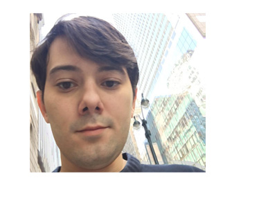 Martin Shkreli selfie photo with highrises in the background. Twitter.