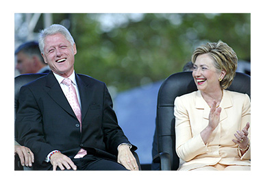 The Clintons having a laugh in 2005.  Sitting in chairs