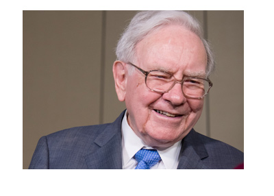 Warren Buffett photographed with a big smile on his face.